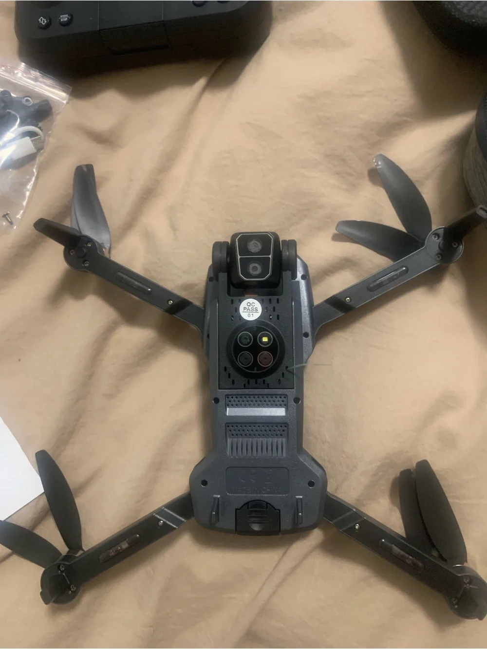 Black VR/Drone Controller with USB Cable and Spare Propellers